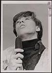 Portrait of Bobby Britain singing [between 1965-1970].