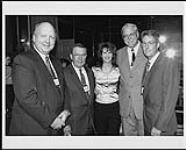 Portrait of Gaylord Executives. L to R: David Hall, E.W. Wendell, Lisa Brokop, Paul Corbin, and Paul Hastaba [between 1995-2000].