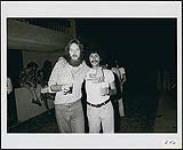 Mushroom recording artist, Jerry Doucette, pictured with Jay Gold (National Promotion - Mushroom Records, Canada) at the 1st annual Mushroom convention in Arizona [between 1978-1979].
