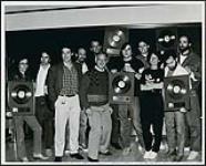 A Gold Record presentation to Steve Earle & the Dukes in Calgary [ca. 1986].