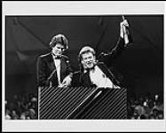 David Foster presenting a Juno Award to Bryan Adams [between 1983-1984].