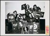 The Scorpions receiving Platinum album awards for "Love at First Sting" and "Blackout" at the Montreal Forum [ca 1984].