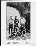 Press portrait of Iron Maiden under a tunnel - Dave Murray, Adrian Smith, Bruce Dickinson, Nicko McBrain, Steve Harris 1987
