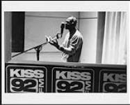 JOE singing into a microphone at Manta Sound Studios 30 mai 2000