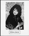 Portrait de presse d'Elaine Jarvis, vêtue d'une veste à paillettes [between 1989-1994].