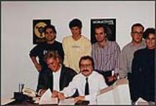 De gauche à droite : (debout) Larry Mancini, Marc Racine, Steve Sectti, Marc Soucy, Martine Bérubé, (assise) Paris Black, Maurice Velenosi [between 1988-1991].