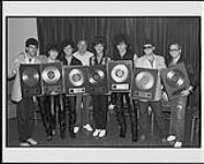 CBS Records Canada was proud to present Epic recording artists The Romantics with Platinum for the album 'In Heat' and the single "Talking In Your Sleep" [ca 1983].
