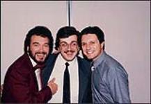 Ronnie Prophet, Paul Roumeliotis et Gilles Godard, en coulisse lors d'un téléthon [between 1980-1985].