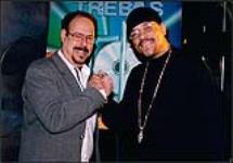 Président de la Trebas Institute, David Leonard, serrant la main à Ice-T [between 1990-2000].