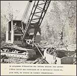 Unidentified man operating heavy machinery [entre 1930-1960]