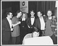 Warner Music Canada went online at their post-Juno party as artists, record company staff, managers and guests shared party highlights and touring information with music fans [between 1988-1990].