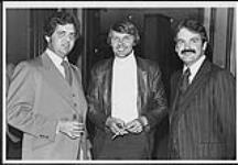 Winnipeg Branch Manager, Pete Anderson, MCA National Sales Manager, Alan Reid, and Ken Graydon, PolyGram Western Regional Manager [between 1975-1979].