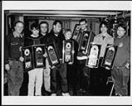 The members of Weezer celebrated their return to Montreal with a sold out show and a presentation of Gold awards for the album "Pinkerton" and Double-Platinum for "Weezer" [entre 1996-1997].