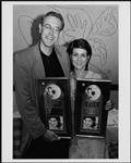 Manager Brian Ferriman and Michelle Wright display two awards that Michelle has received [ca 1996].