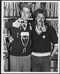 Cheap Trick's Rick Nielson with CKOI FM's Program Director Guy Aubry [between 1977-1980].