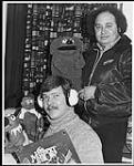 Kermit does the DJ work, while CFTR'S Jim Brady and Ron Robles pose for the picture [between 1977-1978].