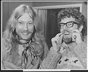 EMI artist Rolf Harris hams for the camera with Bruce Heyding of CHFI Radio [between 1974-1976].