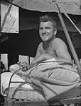 Pte. Ernest Young, of Bancroft, Ontario shows off his Sicilian tan in a British military hospital in North Africa 1943.