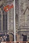 Old Canadian Flag being lowered for last time Parliament Hill - portrait view 1965.