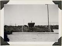 [Pond from overflow of sewage disposal Edmonton Indian Residential School, Alberta, September 30, 1948]