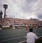 Le sprinter canadien Harry Jerome lors de l'épreuve du 100m en athlétisme aux Jeux panaméricains de 1967 à Winnipeg 1967.