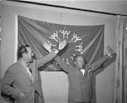 Dupuy presents Expo flag to the Montreal Press Club June 11, 1965