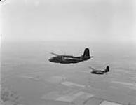 Two 418 Squadron Bostons in flight 14 May 1943.