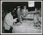 Shoppers at the jewellery counter - Vancouver, Burnaby, British Columbia 1954