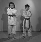 Patsy Hatashita and Edward McDermott in Judo uniforms 1955