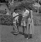 Dr. Lockard, his wife, and an Indonesian woman who works for the Lockard's 1957