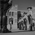 RCMP officers at attention 1957