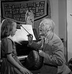Dr. Barbeau and his granddaughter Caroline Price 1958