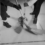 A curling face off 1959