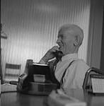 An elderly man on the telephone 1959