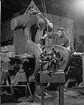 Art Price working on a sculpture 1960