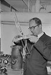 Dr. K. M. Baird, who worked on a new world standard of length 1960