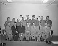 Soldiers receive Swimming Diplomas. Ottawa. Front row, lett to right: S/Sgt. K.D. Reid, Maj. R.R. Brown, Maj. W.G. Milne, Maj-Gen. J.V. Allard, Col. J. Wallis, Capt. W.A. MacIntosh and Lt. J.G. Cox. Back row, left to right: Sgt. C. Attwell, Cpl. K.A. Pasher, Cpl. R.G. Goulet, Sgt. H.M. Beaudry, Cpl. C.G. Cummings, Sgt. G.K. Miller, Sgt. A.C. Ferguson, Sgt. W.A. Mitchell and Cpl. O. Boyko July 1958.