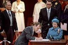 Chrétien signing the Proclamation of the Constitution Act, 1982 1980 - 1984