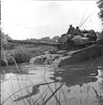 EX. Cdn Club. Take a look at this one you won't see it too often, Centurions are not meant to wade waist deep in water, the driver knows it well which may explain the slightly worried look on his brow, white the two in the turret keep a close eye on the situation 25-28 September 1972.