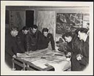 W/C G.H. Gatheral leads a mission planning session in Debden 1942