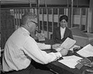 [Andrew] Kniewasser and secretary [between 1964-1967]