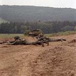 Fallex 84 - Infantry APC's & tanks. Hohenfels West Germany. Infantry and leopard tank work together during the training exercises held at Hohenfels as part of the NATO fall manoeuvres. 27 August 1984.