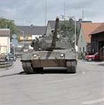 Fallex 84 Bavaria West Germany. Leopard tanks drives down street of small German village, during the training exercises held as part of NATO fall manoeuvres September 1984.