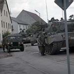 ILC84-313 Fallex 84 Bavaria West Germany. Tanks line up on the streets of a small German village, during the training exercises, which is part of the annual NATO fall manoeuvres September 1984.
