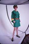 Woman modelling Youth pavilion uniform [ca. 1963-1967]