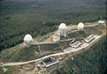 Aerial view of radar station CFS Baldy Hughes, BC April 1975.