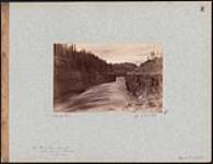 Looking up from lower end of Miles Canyon, Lewes (Yukon River), 1887 1887