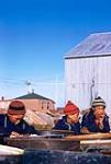 [Three Inuit boys]. Original title: 3 Eskimo Boys 5 September 1958