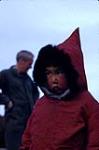 [A young Inuk girl wearing a red silapaaq]. Original title: A little red devil 29 September 1958