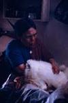 [Woman sewing fur] [ca. 29 April 1966]